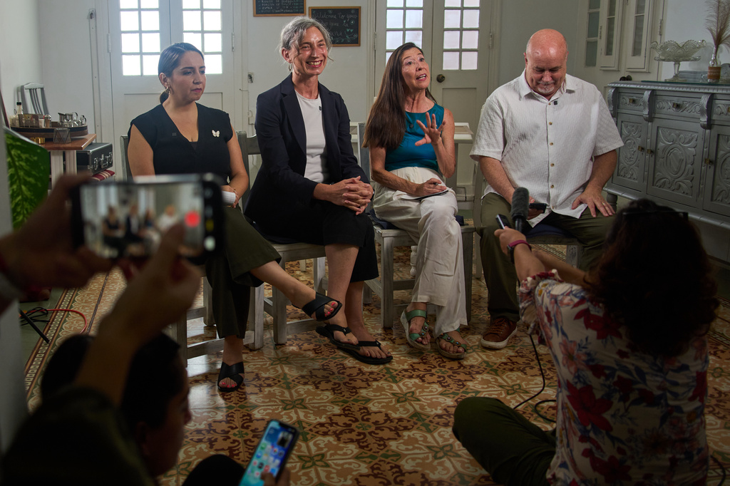 From left, U.S. Representatives Delia C. Ramirez of Illinois, Maxine Dexter of Oregon, Teresa Leger Fernández of New Mexico and Mark Pocan of Wisconsin, all Democrats, hold a news conference in Havana, Cuba, Sunday, July 12, 2026. (AP Photo/Ramon Espinosa)