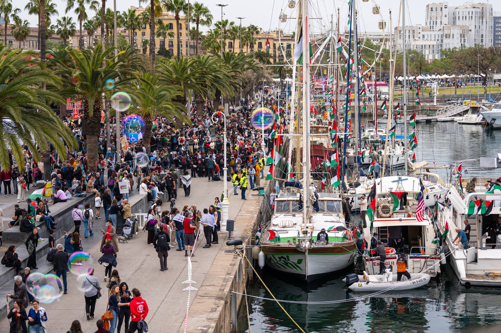 Boats carrying activists and humanitarian aid for Palestinians in Gaza, part of the Global Sumud Flotilla, are docked at the port of Barcelona, Spain, Sunday, April 12, 2026. (AP Photo/Joan Mateu Parra)