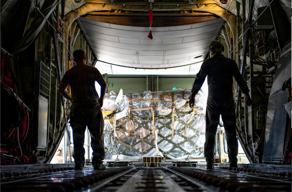 This photo provided by U.S. Air Force, U.S. Air Force loadmasters assigned to the 36th Airlift Squadron prepare to offload a pallet of cargo from a C-130J Super Hercules from the 36 AS in Saipan, Commonwealth of the Northern Mariana Islands, April 19, 2026. . (Senior Airman Tallon Bratton/U.S. Air Force via AP)