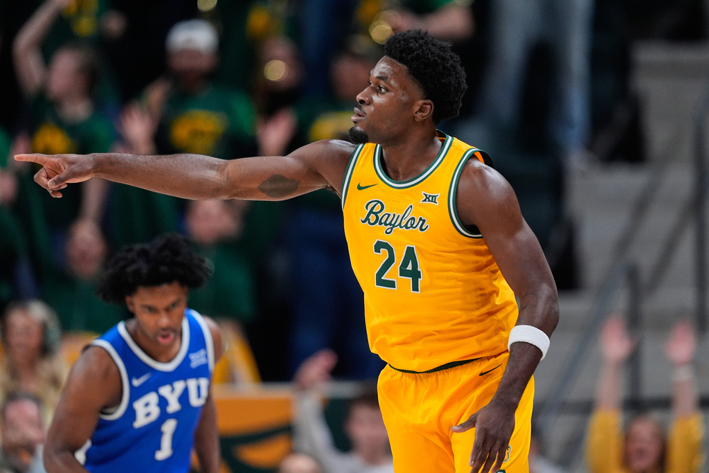 Baylor guard Tounde Yessoufou celebrates his three-pointer in the first half of an NCAA college basketball game against BYU Tuesday, Feb. 10, 2026, in Waco, Texas. (AP Photo/Tony Gutierrez)