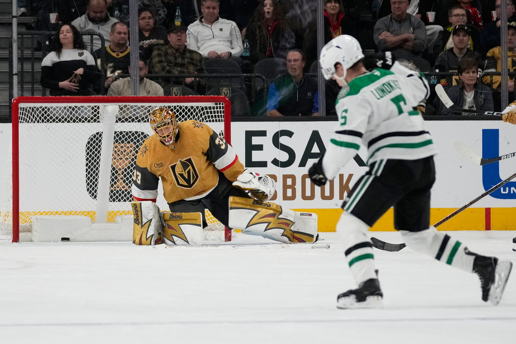 Vegas Golden Knights goaltender Adin Hill (33) reacts after he was scored on by the Dallas Stars during the second period of an NHL hockey game Thursday, Jan. 29, 2026, in Las Vegas. (AP Photo/John Locher)