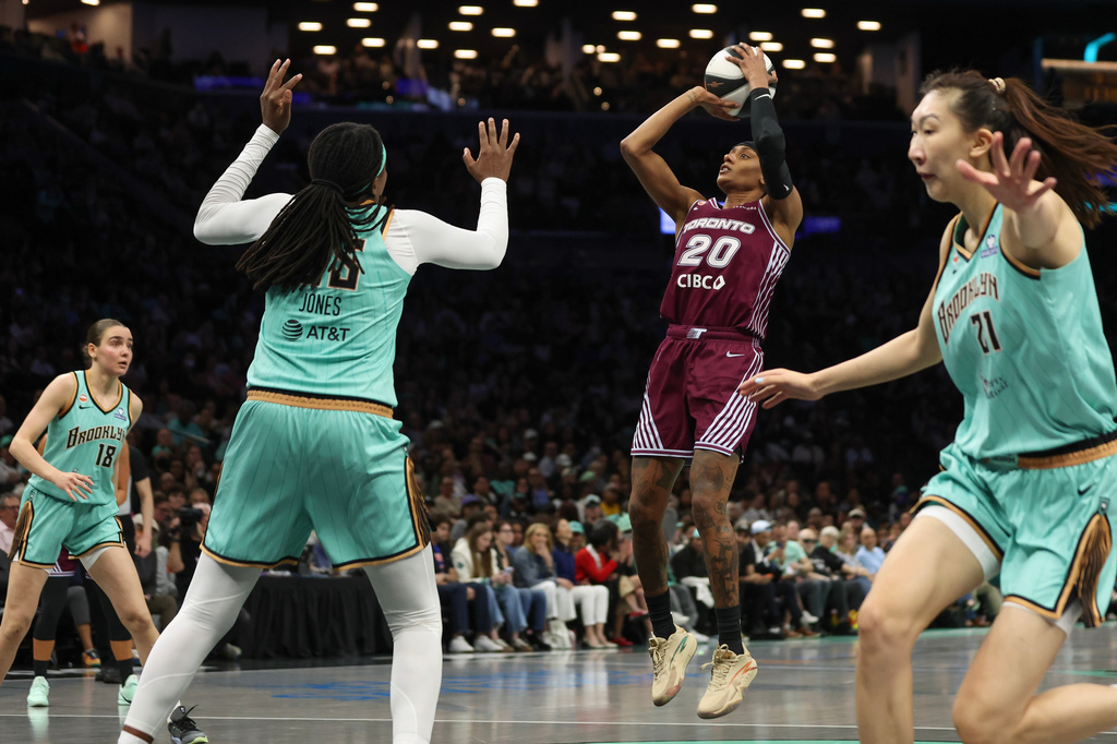 Toronto Tempo guard Brittney Sykes (20) shoots the ball during the second half of a WNBA basketball game against the New York Liberty, Wednesday, June 3, 2026, in New York. (AP Photo/Heather Khalifa)