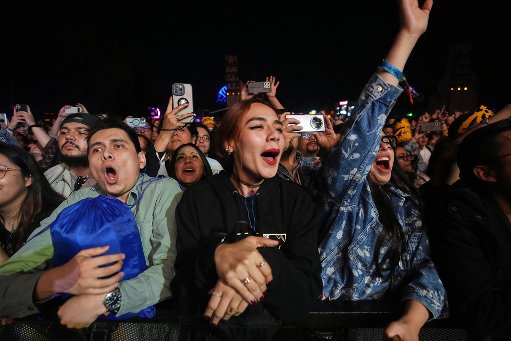 Fans of the U.S. band, Cannons, react during the Corona Capital music festival in Mexico City, Saturday, Nov. 15, 2025. (AP Photo/Claudia Rosel)