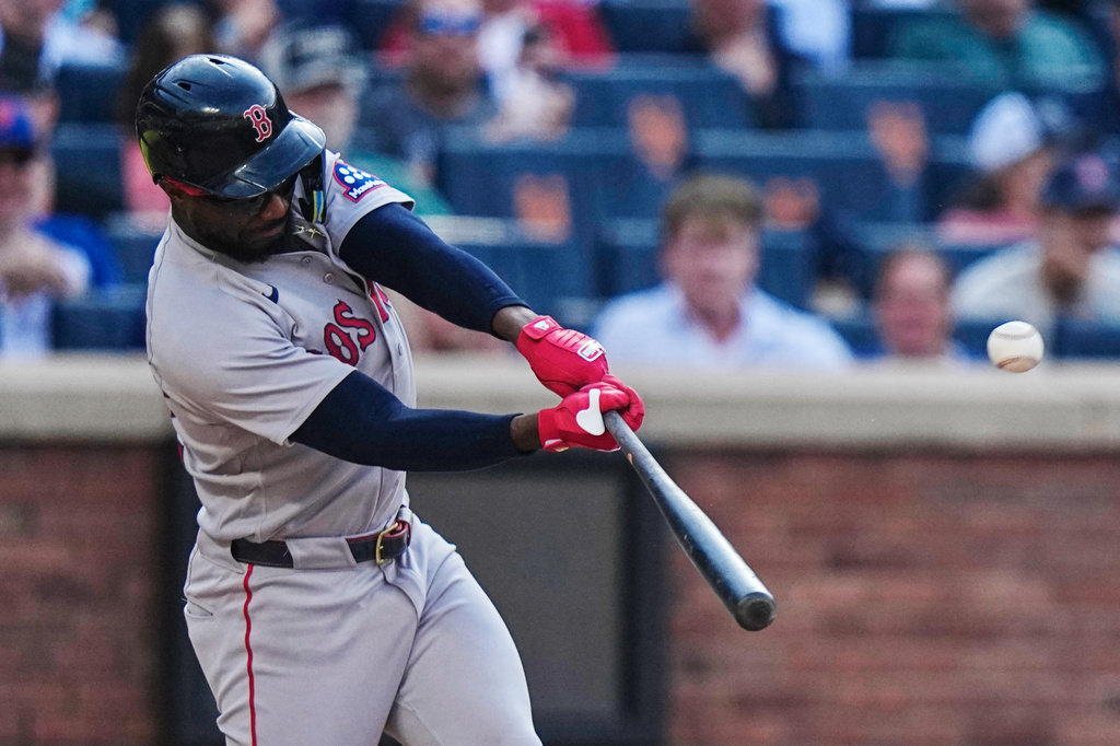 Boston Red Sox's Andruw Monasterio hits a two-run home run during the fourth inning of a baseball game against the New York Mets Saturday, July 11, 2026, in New York. (AP Photo/Frank Franklin II)