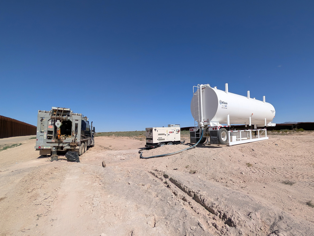 Construction crews drill wells for border wall construction in July 2026, in Luna County, N.M., along the US-Mexico border. (Russell Johnson via AP)