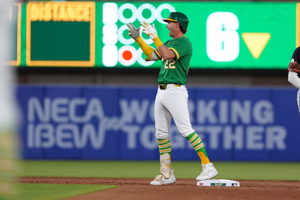 Athletics' Jeff McNeil (22) reacts after hitting an RBI double in the sixth inning during a baseball game against the Minnesota Twins Wednesday, Aug. 26, 2026, in West Sacramento, Calif. (AP Photo/Alan Greth)