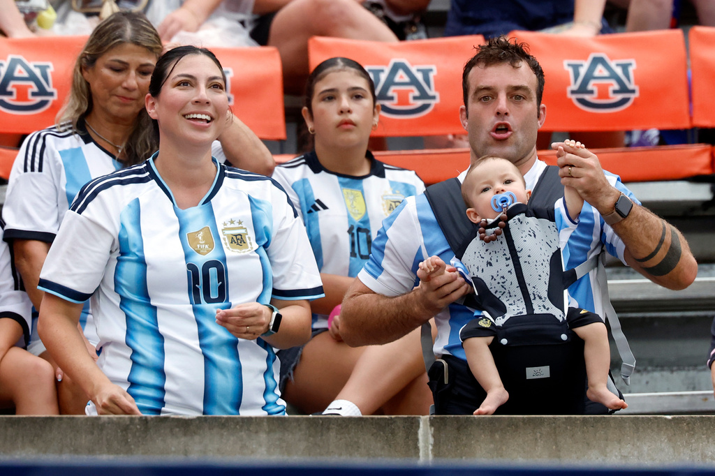 Fans cheer before the first half of an international friendly match between Argentina and Iceland, Tuesday, June 9, 2026, in Auburn, Ala. (AP Photo/Butch Dill)