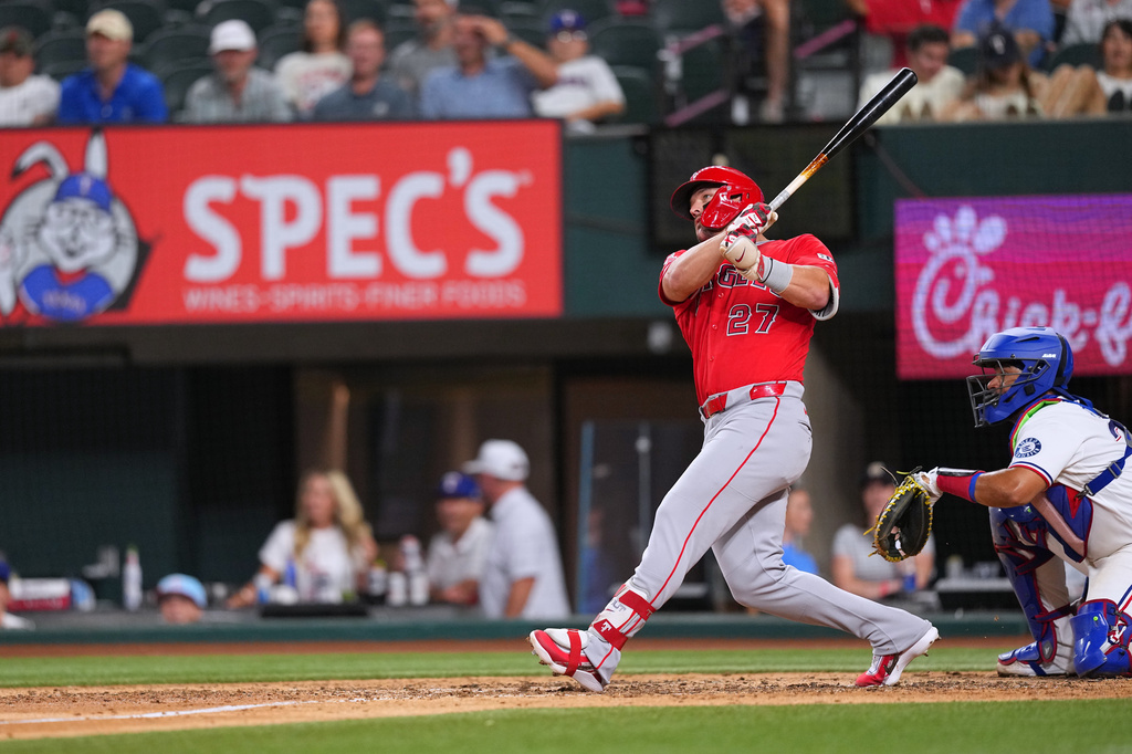 Los Angeles Angels designated hitter Mike Trout watches his two-run home run against the Texas Rangers during the eighth inning of a baseball game, Wednesday, July 8, 2026, in Arlington, Texas. (AP Photo/Julio Cortez)