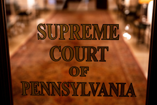 FILE - A sign on a door at The Supreme Court of Pennsylvania is pictured at the Capitol in Harrisburg, Pa., Feb. 21, 2023. (AP Photo/Matt Rourke, File) FILE - A sign on a door at The Supreme Court of Pennsylvania is pictured at the Capitol in Harrisburg, Pa., Feb. 21, 2023. (AP Photo/Matt Rourke, File)