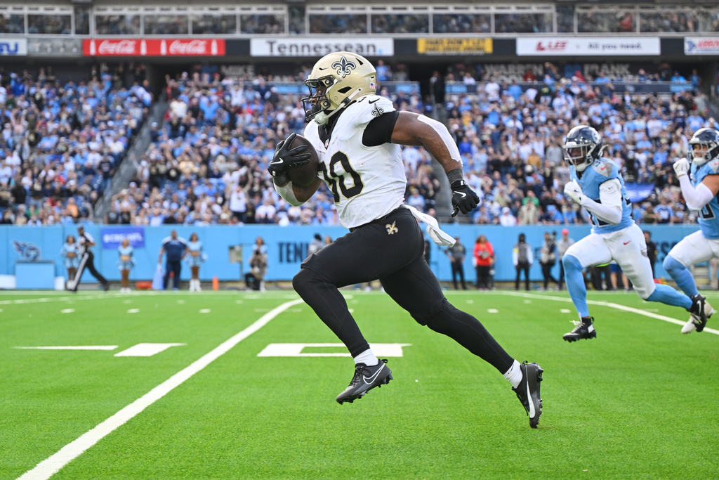 New Orleans Saints running back Audric Estime (30) carries for a touchdown against the Tennessee Titans in the second half of an NFL football game, Sunday, Dec. 28, 2025, in Nashville, Tenn. (AP Photo/John Amis)
