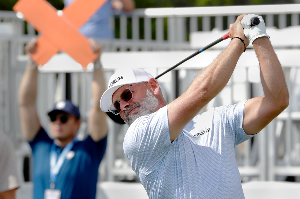 Paul Waring tees off on the 18th hole during the first round of the Texas Children's Houston Open golf tournament Thursday, March 26, 2026, in Houston. (AP Photo/Michael Wyke)