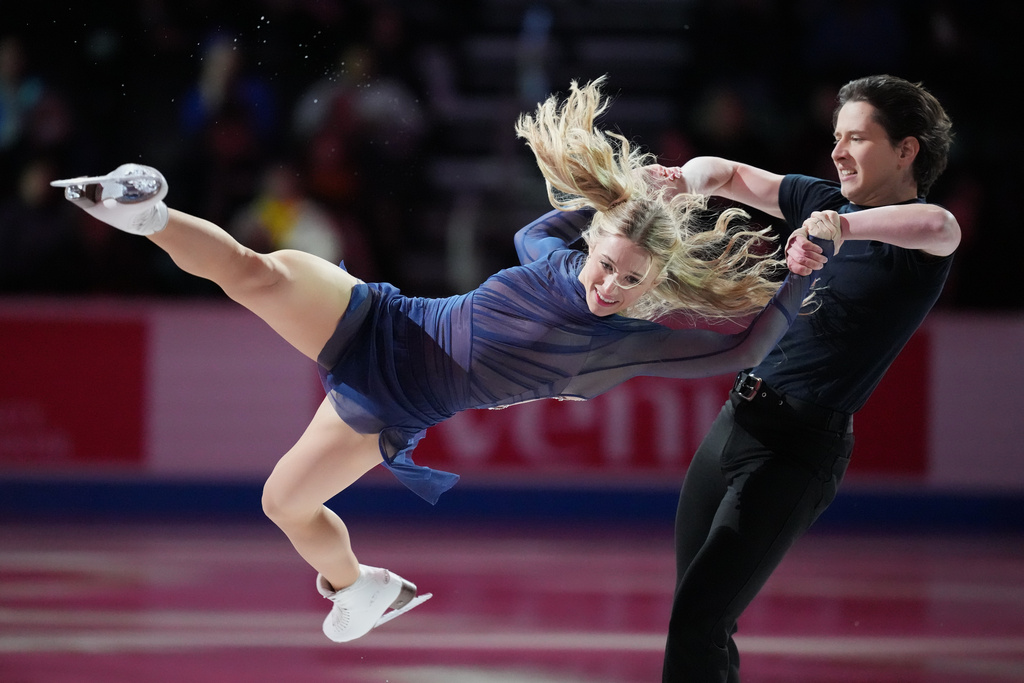 Emilea Zingas and Vadym Kolesnik skates during the "Making Team USA" performance at the U.S. Figure Skating Championships, Sunday, Jan. 11, 2026, in St. Louis. (AP Photo/Stephanie Scarbrough)
