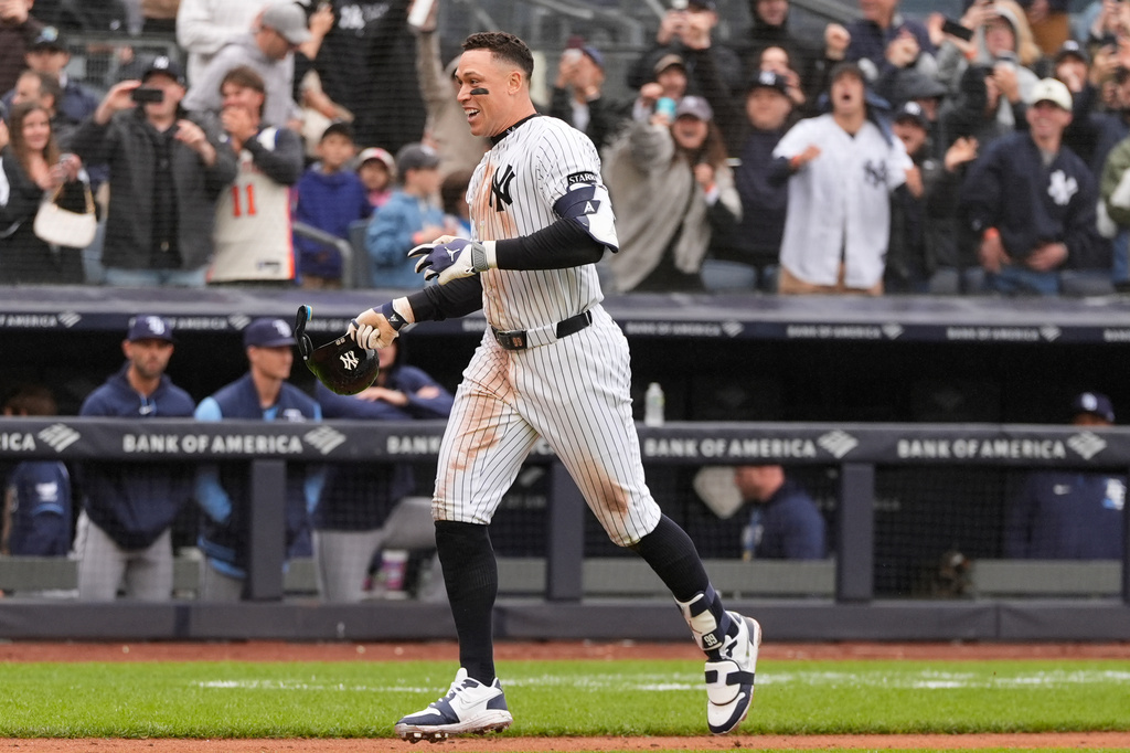 New York Yankees' Aaron Judge reacts after hitting a two-run walk-off home run during the ninth inning of a baseball game against the Tampa Bay Rays, Sunday, May 24, 2026, in New York. (AP Photo/Seth Wenig)
