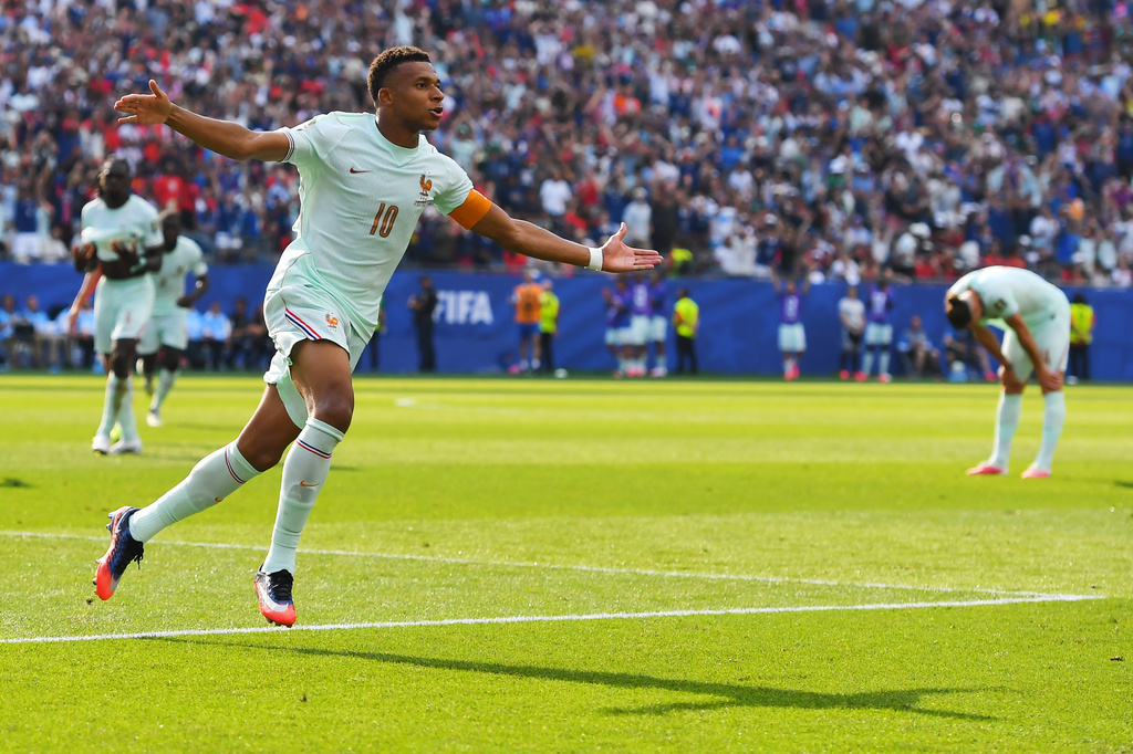 France's Kylian Mbappe (10) celebrates scoring the opening goal during the World Cup quarterfinal soccer match between France and Morocco in Foxborough, Mass., near Boston, Thursday, July 9, 2026. (AP Photo/Steven Senne)