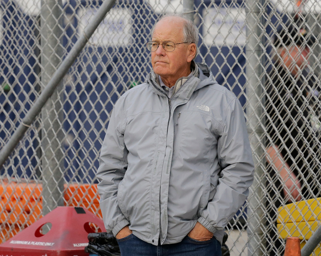 FILE - In this Feb. 9, 2019, file photo, Jim France, executive vice president of NASCAR, stands on pit road as he watches auto racing at Daytona International Speedway, in Daytona Beach, Fla.. (AP Photo/Terry Renna, File)