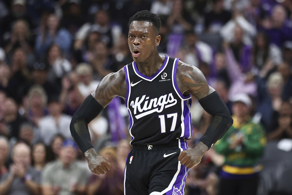 Sacramento Kings guard Dennis Schröder celebrates after guard Zach Lavine scored during the first half of an NBA basketball game against the Utah Jazz, Friday, Oct. 24, 2025, in Sacramento, Calif. (AP Photo/Sara Nevis)