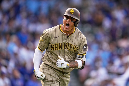 San Diego Padres' Manny Machado is reacts after hitting a two-run home run during the fifth inning of Game 2 of a National League wild card baseball game Wednesday, Oct. 1, 2025, in Chicago. (AP Photo/Erin Hooley) San Diego Padres' Manny Machado is reacts after hitting a two-run home run during the fifth inning of Game 2 of a National League wild card baseball game Wednesday, Oct. 1, 2025, in Chicago. (AP Photo/Erin Hooley)