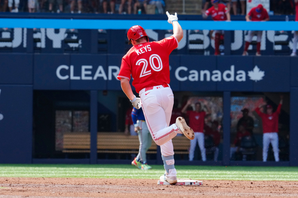 Toronto Blue Jays third baseman Sean Keys (20) rounds the bases after hitting a three run home run against the New York Mets during third inning MLB baseball action in Toronto on Wednesday, July 1, 2026. (Frank Gunn/The Canadian Press via AP)