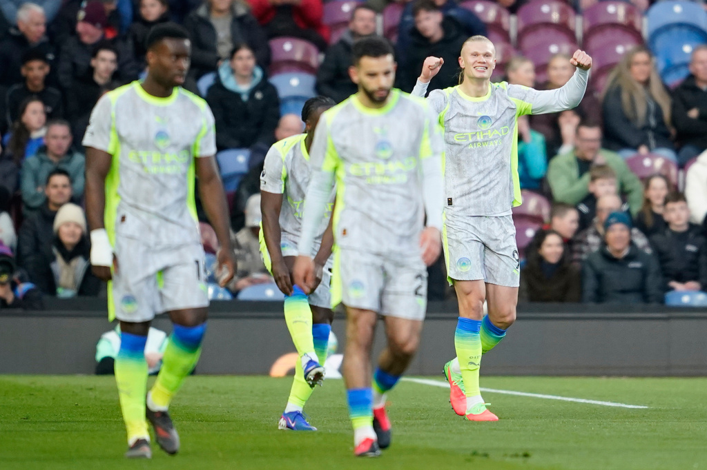Manchester City's Erling Haaland celebrates after scoring during the Premier League soccer match between Burnley and Manchester City in Burnley, England, Wednesday, April 22, 2026. (AP Photo/Dave Thompson)