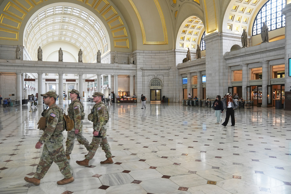 FILE - Members of the National Guard walking in the lobby of Union Station in Washington, May 27, 2026. (AP Photo/Matt Rourke, file)