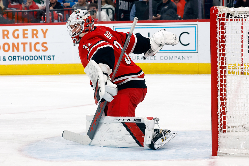 Carolina Hurricanes goaltender Brandon Bussi protects the net against the St. Louis Blues during the first period of an NHL hockey game in Raleigh, N.C., Thursday, March 12, 2026. (AP Photo/Karl DeBlaker)