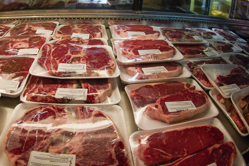 FILE - Rows of fresh cut beef are displayed in the coolers of the retail section at the Wight's Meat Packing facility, June 16, 2022, in Fombell, Pa. The U.S. Department of Agriculture on Monday, March 11, 2024, announced new requirements for meat and egg producers who use the voluntary &ldquo;Product of USA&rdquo; or &ldquo;Made in the USA&rdquo; labels on their products. (AP Photo/Keith Srakocic, File)