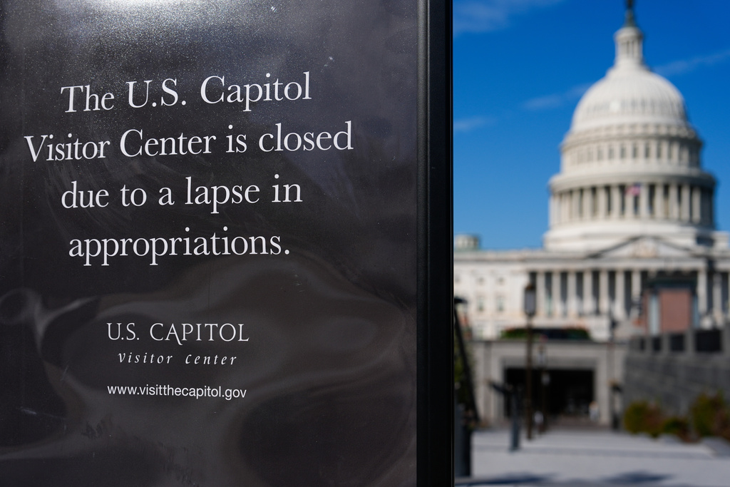 A sign announces that the U.S. Capitol Visitor Center is closed, on the first day of a partial government shutdown, Wednesday, Oct. 1, 2025, in Washington. (AP Photo/Julia Demaree Nikhinson)