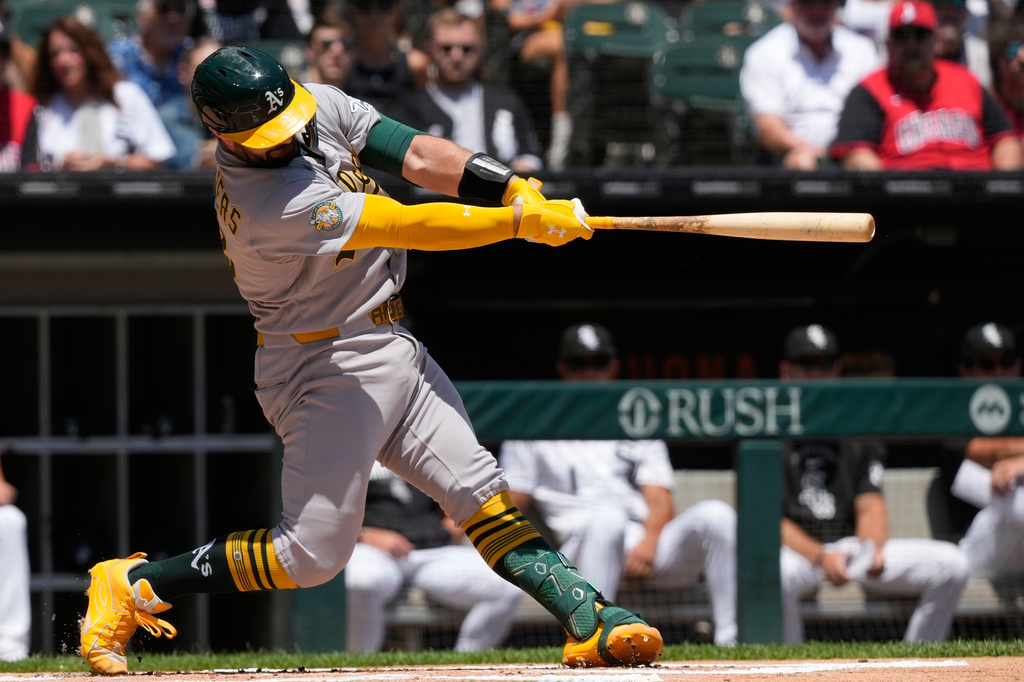 Athletics' Shea Langeliers hits a solo home run during the first inning of a baseball game against the Chicago White Sox in Chicago, Sunday, July 12, 2026. (AP Photo/Nam Y. Huh)