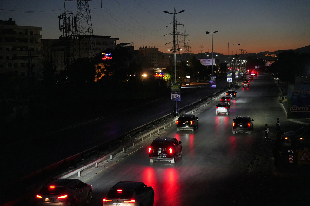 The convoy of French President Emmanuel Macron enters Damascus after arriving in Syria, becoming the first major Western leader to visit the country since Bashar Assad's ouster in 2024, in Damascus, Syria, Monday, July 6, 2026. (AP Photo/Omar Albam)