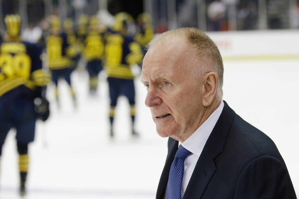 FILE - Michigan head coach Red Berenson walks across the ice after the Midwest Regional final against North Dakota in the men's NCAA college hockey tournament, Saturday, March 26, 2016, in Cincinnati. (AP Photo/John Minchillo, File)