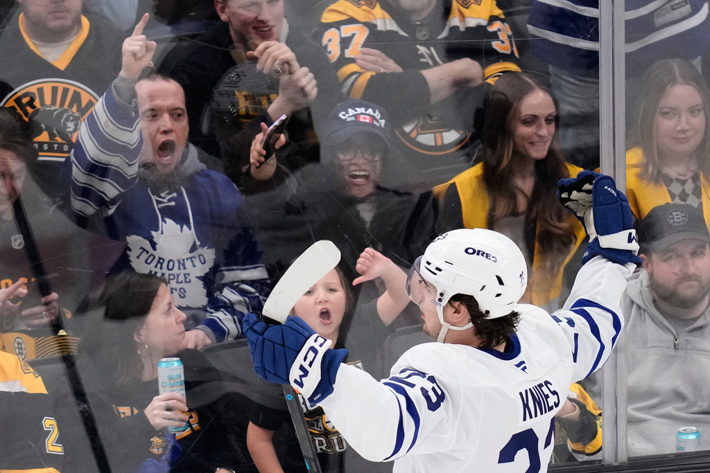 Toronto Maple Leafs left wing Matthew Knies (23) celebrates after his goal against the Boston Bruins during the second period of an NHL hockey game, Tuesday, March 24, 2026, in Boston. (AP Photo/Charles Krupa)