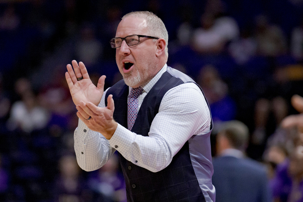 FILE - Texas A&amp;M head coach Buzz Williams reacts during the first half of an NCAA college basketball game against LSU in Baton Rouge, La., March 8, 2025. (AP Photo/Matthew Hinton, File)