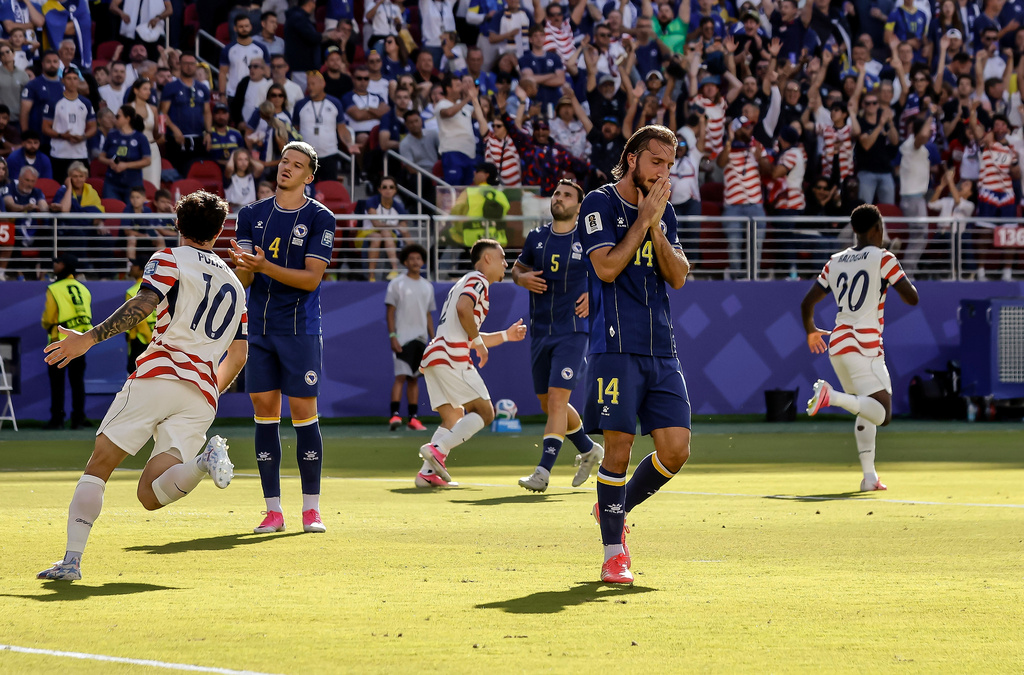 Bosnia and Herzegovina players react to United States' Folarin Balogun's (20) goal in the first half of a 2026 FIFA World Cup Round of 32 match at Levi's Stadium in Santa Clara, Calif., near San Francisco, Wednesday, July 1, 2026. (Carlos Avila Gonzalez/San Francisco Chronicle via AP)