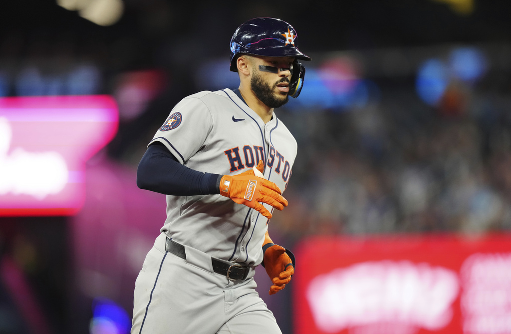 Houston Astros' Carlos Correa rounds the bases on his solo home run against the Toronto Blue Jays during the sixth inning of a baseball game in Toronto on Wednesday, Sept. 10, 2025. (Nathan Denette/The Canadian Press via AP)