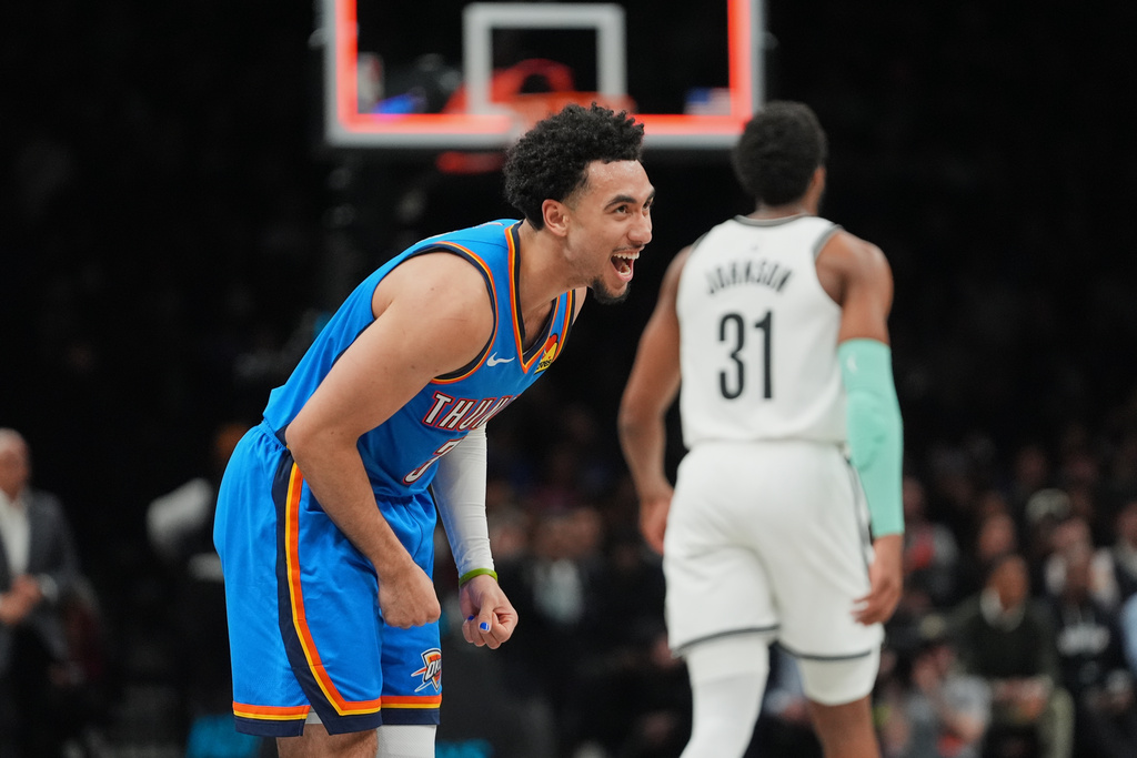 Oklahoma City Thunder's Jared McCain (3) celebrates after scoring during the second half of an NBA basketball game against the Brooklyn Nets Wednesday, March 18, 2026, in New York. (AP Photo/Frank Franklin II)