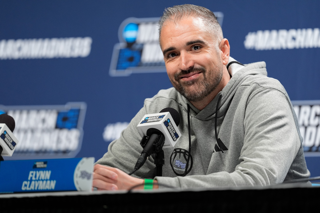 High Point head coach Flynn Clayman speaks during a news conference Friday, March 20, 2026, in Portland, Ore, at the NCAA college basketball tournament. (AP Photo/Jenny Kane)