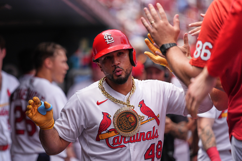 St. Louis Cardinals' Iván Herrera is congratulated by teammates after hitting a solo home run during the third inning in the first game of a baseball doubleheader against the Milwaukee Brewers Tuesday, July 7, 2026, in St. Louis. (AP Photo/Jeff Roberson)