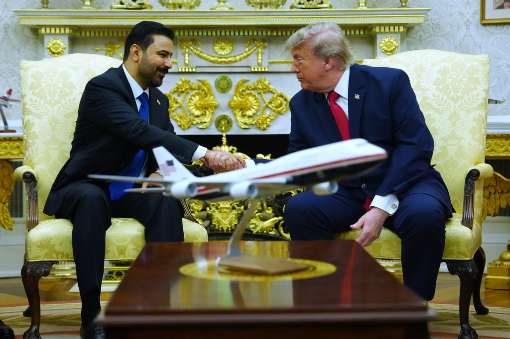 President Donald Trump meets with Iraq's Prime Minister Ali al-Zaidi in the Oval Office of the White House, Tuesday, July 14, 2026, in Washington. (AP Photo/Julia Demaree Nikhinson)