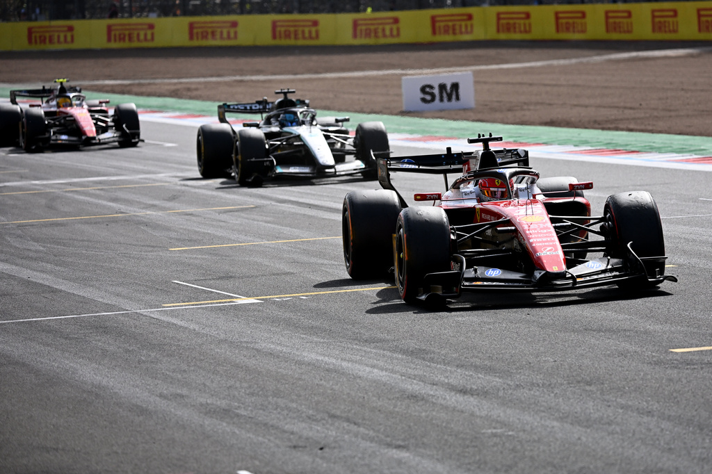 Ferrari driver Charles Leclerc of Monaco crosses the finish line to win the British F1 Grand Prix, in Silverstone, England, Sunday, July 5, 2026. (Peter Powell/Pool via AP)