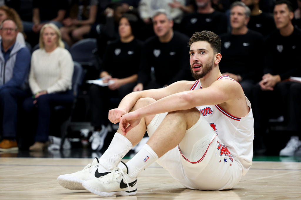 Houston Rockets center Alperen Sengun reacts during the first half of an NBA basketball game against the Minnesota Timberwolves, Wednesday, March 25, 2026, in Minneapolis. (AP Photo/Ellen Schmidt)