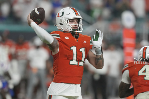 Miami quarterback Carson Beck (11) aims a pass during the second half of an NCAA college football game against Florida, Saturday, Sept. 20, 2025, in Miami Gardens, Fla. (AP Photo/Marta Lavandier) Miami quarterback Carson Beck (11) aims a pass during the second half of an NCAA college football game against Florida, Saturday, Sept. 20, 2025, in Miami Gardens, Fla. (AP Photo/Marta Lavandier)