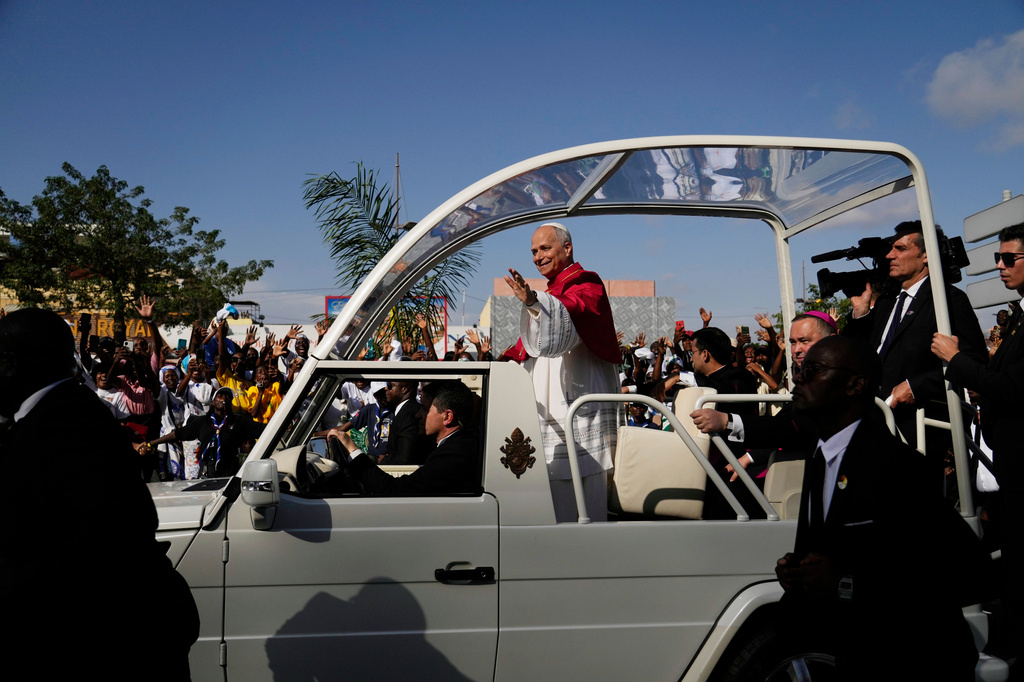 Pope Leo XIV waves after arriving in Luanda, Angola, Saturday, April 18, 2026 on the sixth day of his 11-day pastoral visit to Africa. (AP Photo/Themba Hadebe)
