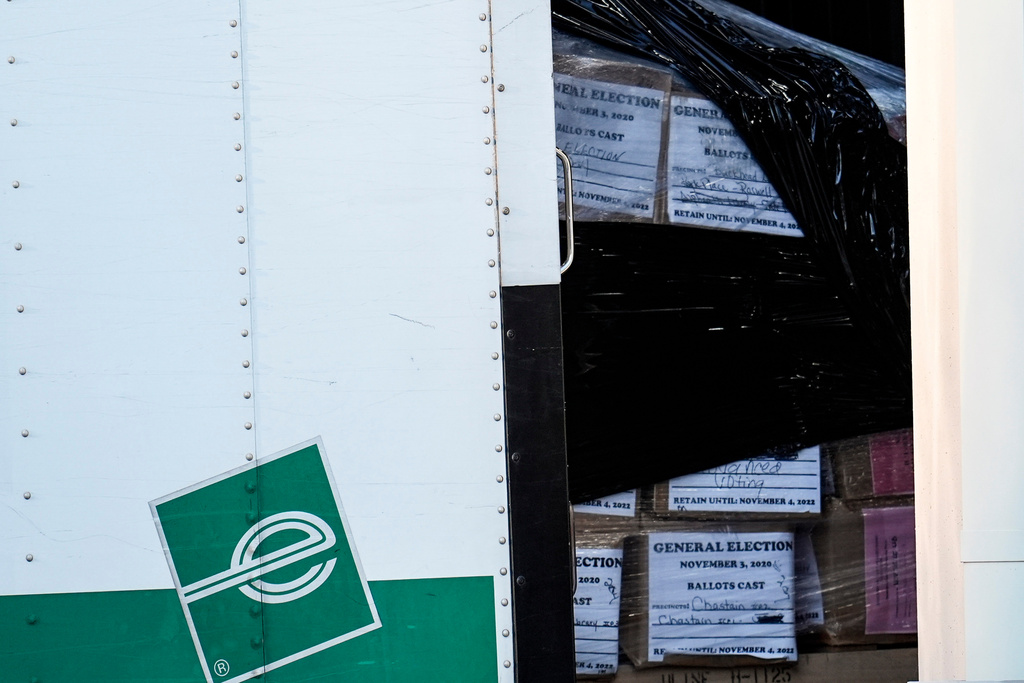 Georgia General Election 2020 ballots are loaded by the FBI onto trucks at the Fulton County Election HUB, Wednesday, Jan. 28, 2026, in Union City, Ga., near Atlanta. (AP Photo/Mike Stewart)