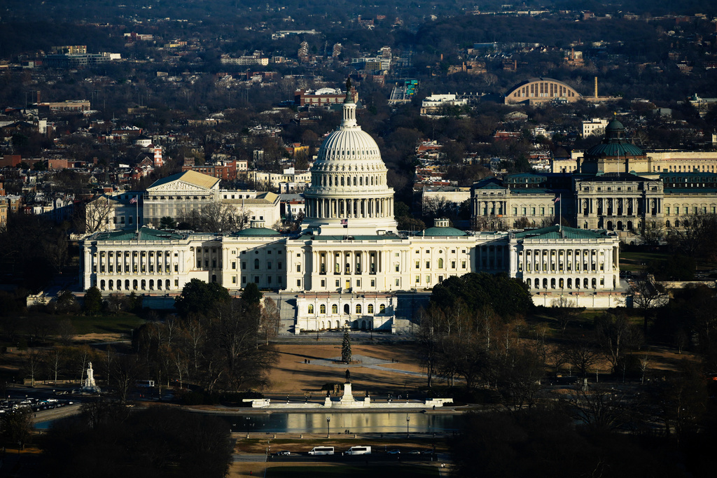 The Capitol is seen from the Washington Monument, Tuesday, Dec. 16, 2025, in Washington. (AP Photo/Julia Demaree Nikhinson)