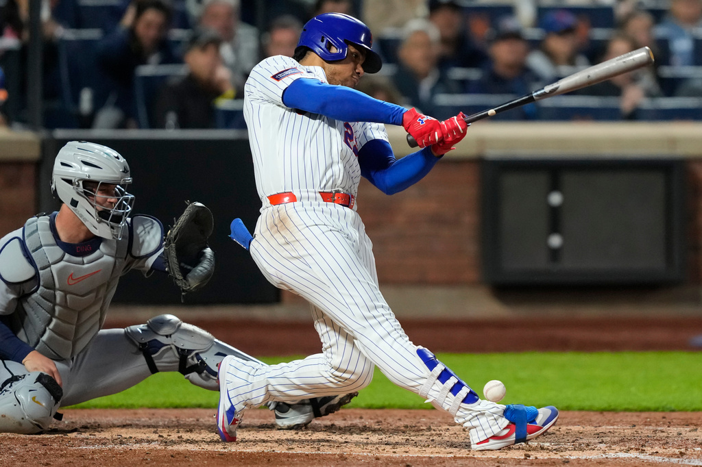New York Mets designated hitter Juan Soto is hit by the ball on his ankle during the third inning of a baseball game against the Detroit Tigers, Wednesday, May 13, 2026, in New York. (AP Photo/Yuki Iwamura)