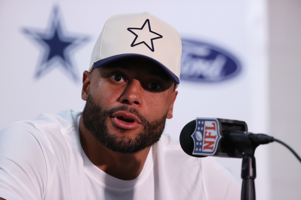 Dallas Cowboys quarterback Dak Prescott talks to reporters following an NFL football game against the New York Giants, Monday, Sept. 14, 2026, in East Rutherford, N.J. (AP Photo/Pamela Smith)