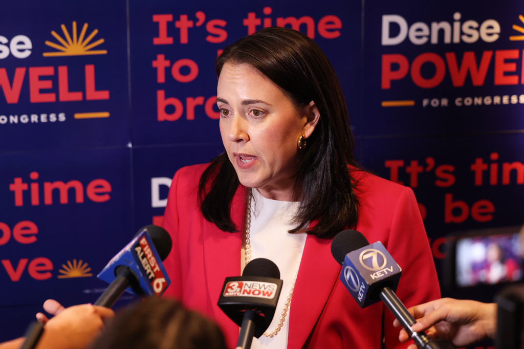 Denise Powell, candidate for the Democratic nomination to the House of Representatives in Nebraska's second district, speaks to media during an election night watch party Tuesday, May 12, 2026, in Omaha, Neb. (AP Photo/Rebecca S. Gratz)