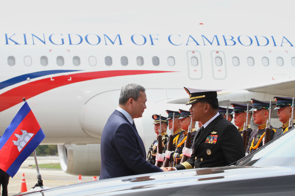 Cambodia's Prime Minister Hun Manet, left, arrives ahead of the 48th ASEAN Summit and Related Meetings in Cebu province, central Philippines on Thursday, May 7, 2026. (AP Photo/Jacqueline Hernandez, Pool) ADDITION: Adds Pool to the caption sign off and instruction.