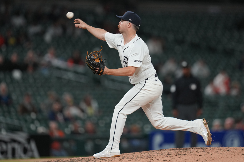 Detroit Tigers' Jake Rogers pitches against the Milwaukee Brewers during the ninth inning of a baseball game Tuesday, April 21, 2026, in Detroit. (AP Photo/Paul Sancya)