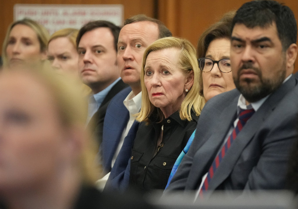 Camp Mystic owner Tweety Eastland, center, attends a hearing about a temporary restraining order regarding the camp, at the Travis County Courthouse in Austin, Texas, on Wednesday, March 4, 2026. (Jay Janner/Austin American-Statesman via AP, Pool)